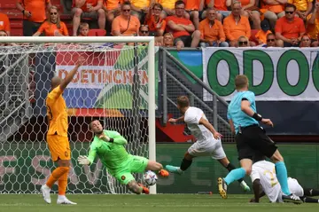 Italy midfielder Davide Frattesi (C) scores his team's second goal in the Nations League third-place play-off