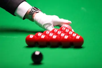 What is the difference between pool and snooker?