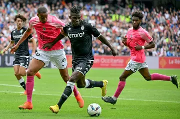 Monaco scorer Breel Embolo (C) takes on the Montpellier defence