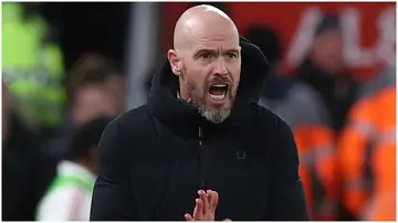 Erik ten Hag watches from the touchline during the Premier League match between Liverpool FC and Manchester United at Anfield. Photo by Matthew Peters.