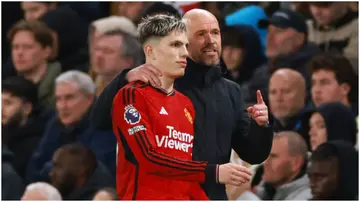 Erik ten Hag with Alejandro Garnacho during the Premier League match between Chelsea FC and Manchester United at Stamford Bridge. Photo by Marc Atkins.