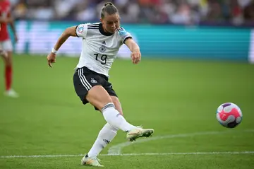 Germany laid down a marker with a 4-0 thrashing of Denmark