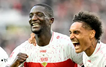 Stuttgart's Serhou Guirassy (left) has scored 14 goals in his opening eight league games -- a Bundesliga record