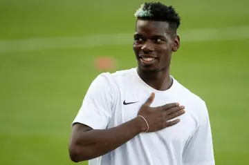 Hand on heart: French World Cup winner Paul Pogba is happy to be 'home' at Juventus