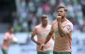 Niclas Fuellkrug celebrates scoring in the Bundesliga against Wolfsburg