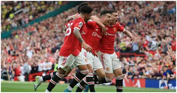 Cristiano Ronaldo celebrates with Diogo Dalot and Jadon Sancho after scoring their 3rd goal during the Premier League match between Manchester United and Norwich. Photo by Simon Stacpoole.