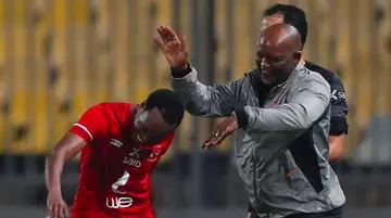 pitso mosimane, percy tau, al ahly, mohamed omar, favouritism
