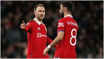 Christian Eriksen celebrates with Bruno Fernandes after scoring during the Carabao Cup Fourth Round match between Manchester United and Burnley. Photo by Lewis Storey.