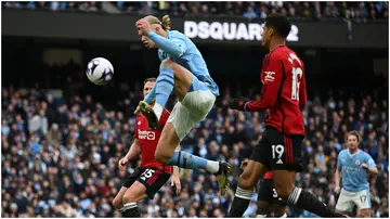 Erling Haaland, Jonny Evans, Raphael Varane, Manchester United, Manchester City, Etihad Stadium, Premier League.