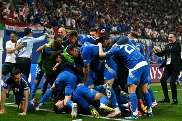 Mattia Zaccagni was bundled by his Italy teammates after firing the Azzurri into the last 16 of Euro 2024