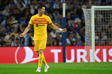 Robert Lewandowski leaves the pitch with an ankle injury during the Champions League match against Porto