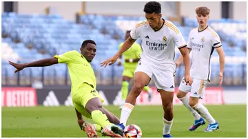 Chrisantus Uche challenges Alvaro Rodriguez during the Primera RFEF Group 2 match between Real Madrid Castilla and AD Ceuta on October 29, 2023. Photo: Angel Martinez.