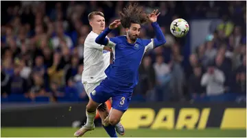 Chelsea's Marc Cucurella is tackled by AFC Wimbledon's James Tilley during the Carabao Cup second round match at Stamford Bridge. Photo by John Walton.