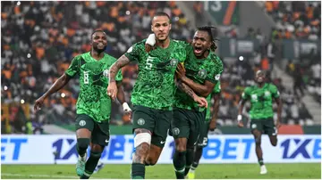 William Troost-Ekong celebrates with teammates after scoring his team's first goal during the Africa Cup of Nations. Photo by Issouf Sanago.