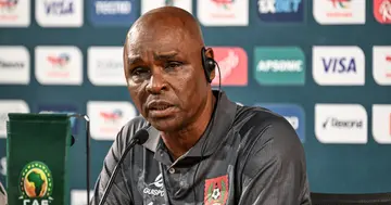 Guinea-Bissau's coach, Baciro Cande speaks during the AFCON post-match conference following their defeat against Nigeria.
