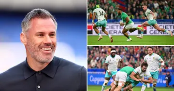 Jamie Carragher watching rugby.