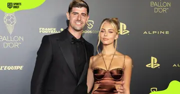 Thibaut Courtois and Mishel Gerzig pictured during the 2022 Ballon d'Or. 