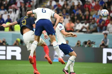 Olivier Giroud rises to head in France's second goal against England