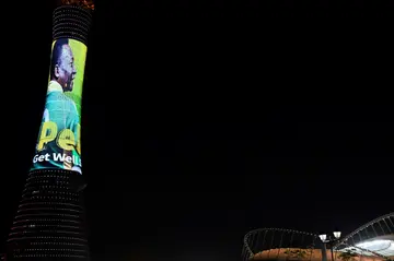 Doha's Aspire Tower is lit up with an image of Pele in his legendary number 10 shirt