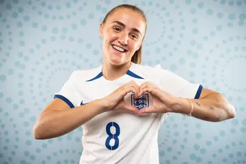 Georgia Stanway smiling in an England kit.