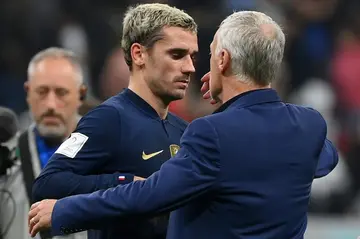 Deschamps with Antoine Griezmann, who has excelled in a midfield role for France in Qatar