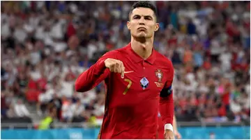 Cristiano Ronaldo celebrates after scoring during the UEFA Euro 2020 Championship match between Portugal and France at Puskas Arena. Photo by Tibor Illyes.