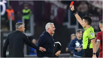 Referee Antonio Rapuano shows the red card to Roma boss Jose Mourinho during the match between Roma and Torino at the Stadio Olimpico. Photo by Massimo Insabato.