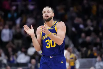 Stephen Curry of the Golden State Warriors celebrates in the fourth quarter against the Indiana Pacers