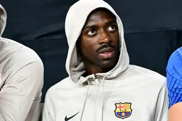 Barcelona's French midfielder Ousmane Dembele looks on ahead of his team's friendly with AC Milan in Las Vegas on Tuesday