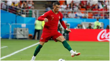 Cristiano Ronaldo dribbles the ball during the Russia 2018 World Cup Group B match between Iran and Portugal at the Mordovia Arena. Photo by Jack Guez.