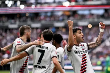 Exequiel Palacios celebrates scoring a penalty in Bayer Leverkusen's 5-1 win over Eintracht Frankfurt