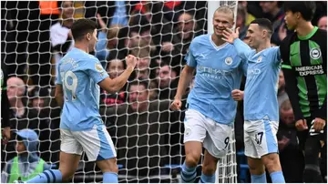 Manchester City stars celebrate during the English Premier League football match between Manchester City and Brighton at the Etihad Stadium. Photo by Oli Scarff.
