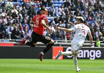 Amine Gouiri (L) scored the opener for Rennes but hosts Lyon hit back with three goals