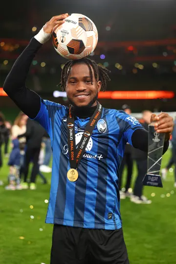 Ademola Lookman poses with his winners' medal, Man of the Match trophy and the match ball at the end of the UEFA Europa League final between Atalanta and Bayer Leverkusen. Photo: Chris Brunskill.