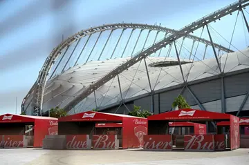 Budweiser beer stands outside the Khalifa International World Cup stadium in Doha