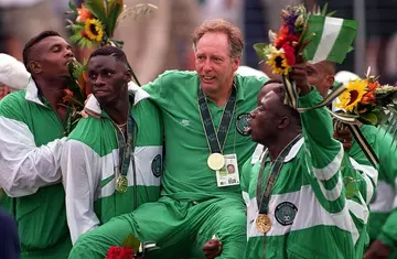 Bonfrere Jo been lifted by the Nigeria U-23 team after helping the side win gold at Atlanta 96 Olympics.