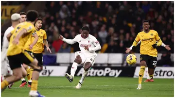 Kobbie Mainoo scores in the final minute of Manchester United's Premier League clash against Wolverhampton Wanderers at the Molineux on February 1, 2024, in England. Photo: Naomi Baker.