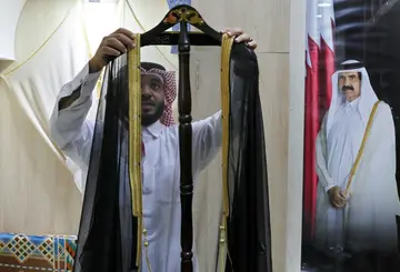 The Al-Salim store, a longstanding bisht supplier to Qatari royalty, normally sells eight to 10 garments a day -- on Monday, the day after the final, sales shot up to 150