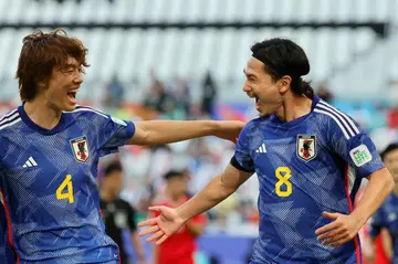 Takumi Minamino gave Japan an 11th-minute lead against Vietnam