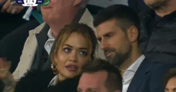 Rita Ora and Novak Djokovic in conversation.