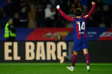 Barcelona forward Joao Felix celebrates scoring the opening goal against his parent club Atletico Madrid on Sunday in La Liga