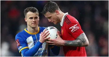 Solly March receives the ball from Wout Weghorst before taking his penalty in the shoot-out following the FA Cup semi-final match between Brighton and Manchester United at Wembley Stadium. Photo by Chris Brunskill.