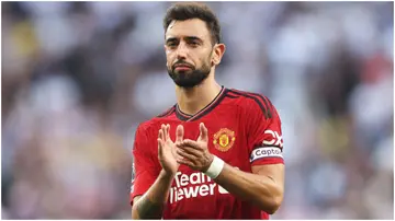 Bruno Fernandes applauds the fans during the Premier League match between Tottenham Hotspur and Manchester United. Photo by Julian Finney.