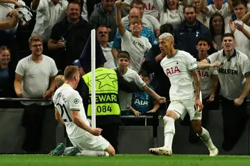 Tottenham striker Richarlison (R) celebrates after scoring against Marseille