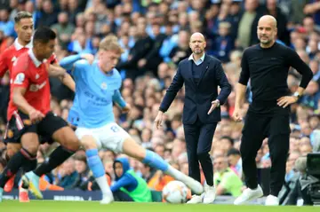 Manchester United manager Erik ten Hag (2nd right) wants to reach the standard of Premier League champions Manchester City
