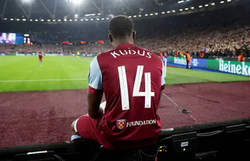 West Ham United's Mohammed Kudus has created an iconic goal celebration by sitting on advertising boards.