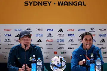 Australian coach Tony Gustavsson (L) and captain Sam Kerr were all smiles at their pre-match press conference