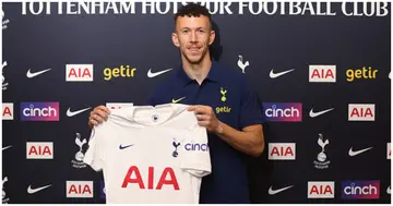 New Tottenham signing Ivan Perisic poses with the Spurs shirt on Tuesday, May 31 in Enfield, England. Photo by Tottenham Hotspur FC.