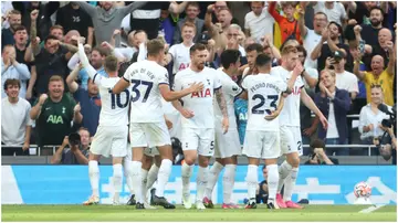 Tottenham Hotspur celebrate their second goal, an own goal by Manchester United's Lisandro Martinez, during their Premier League match. Photo by Rob Newell.