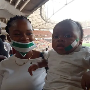 Four-Month Old Baby Spotted at Abuja stadium to Support Super Eagles Against Ghana